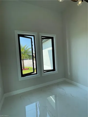Open windows in dining area and bedroom/den