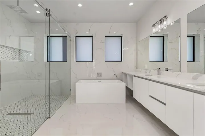 Large shower room and separate deep tub