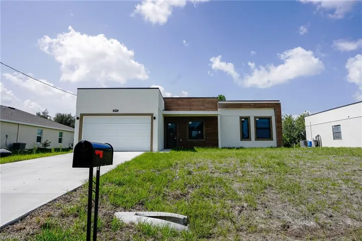 Contemporary house featuring a garage