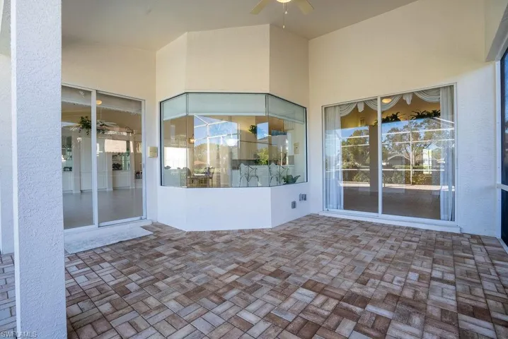 View of patio featuring a ceiling fan