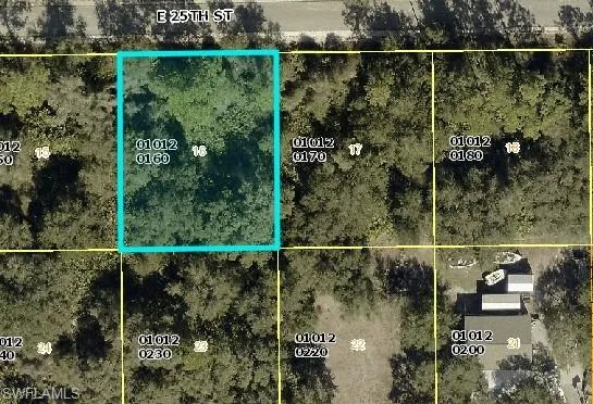Aerial map of property and surrounding area featuring property parcel outlined