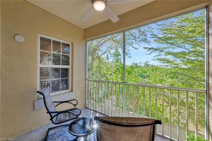 Balcony featuring ceiling fan
