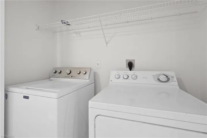 laundry in hall way upstairs