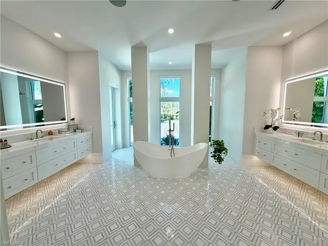 Primary bathroom with door to outside shower