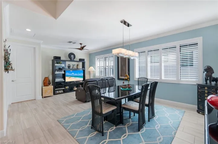 Dining room featuring ornamental molding