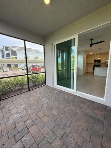 Unfurnished sunroom with healthy amount of natural light