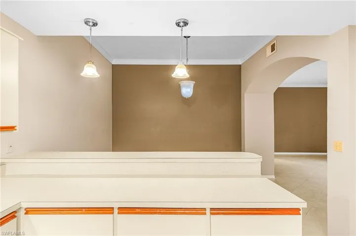 Kitchen Overlooks Formal Dining Area