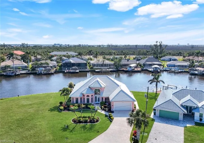 Aerial of house and 200" canal