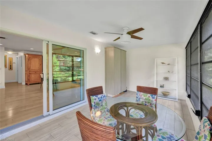 Light and bright. The lanai is partially furnished and has a tile floor and ceiling fan.