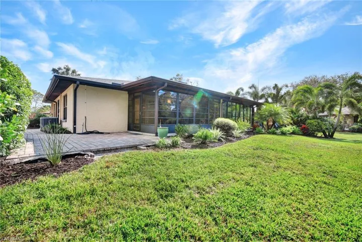 Privacy abounds in the rear yard of this nicely landscaped property.