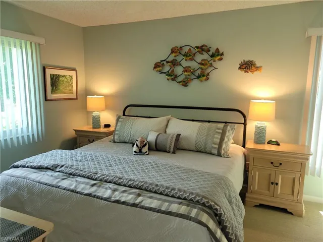 Primary bedroom with extra window for more natural light.Sleep number king-sized bed