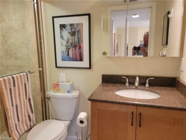 Totally updated bath with raised vanity,toilet, sink and faucets