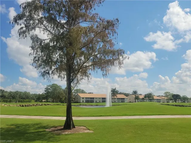 See the lake and fountain right from your private lanai