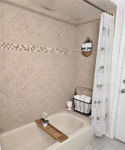 Bathroom featuring tile patterned flooring