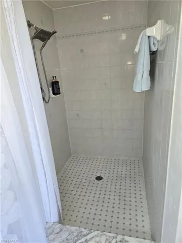 Bathroom featuring walk in shower