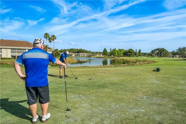 Surrounding community with a water view