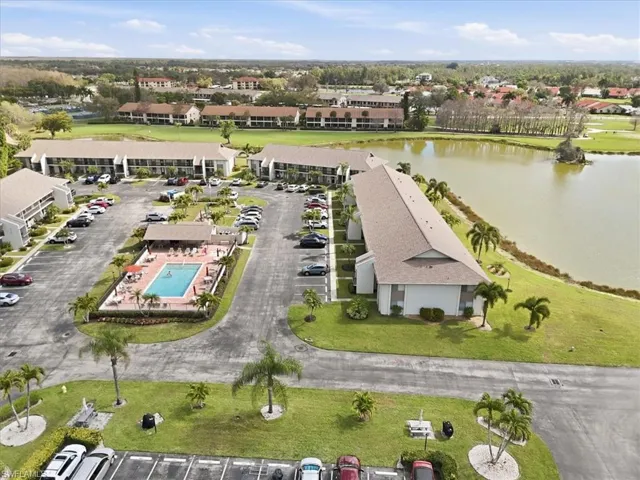 Aerial view of residential area with a large body of water