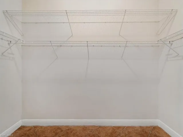 one of 2 walk in closets