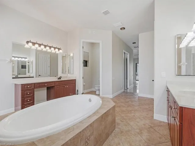 Tub and Dual Vanities