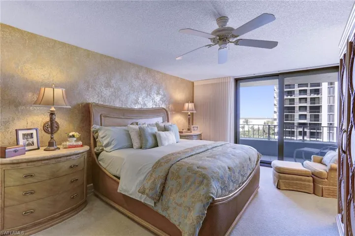 Master Suite with entry to balcony and view of the beach/gulf