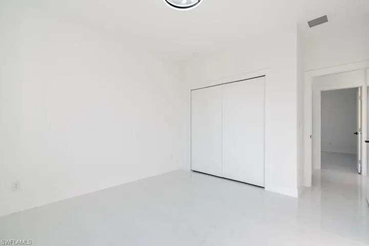 Unfurnished bedroom featuring a closet