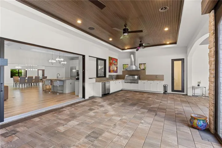 Screened patio with summer kitchen