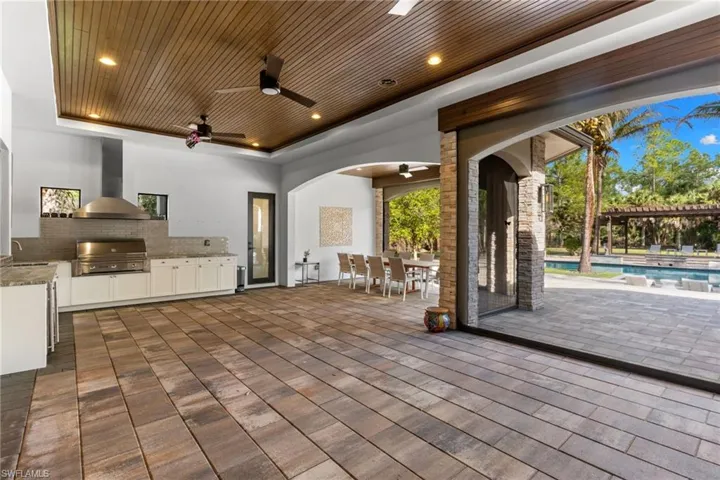 Screened patio with summer kitchen