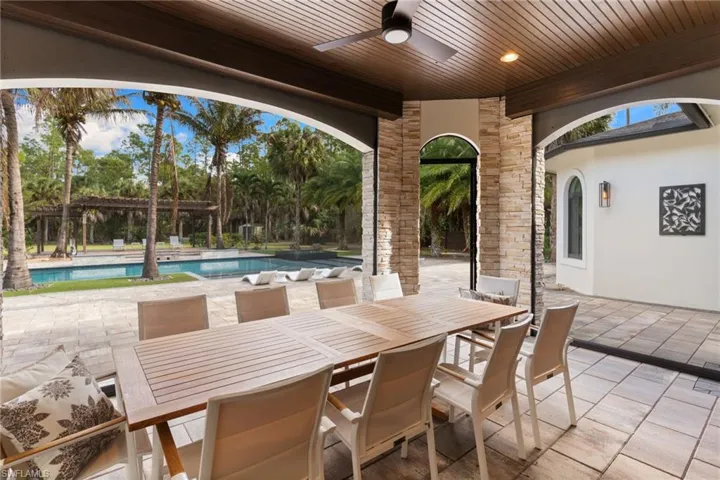 Screened patio with summer kitchen