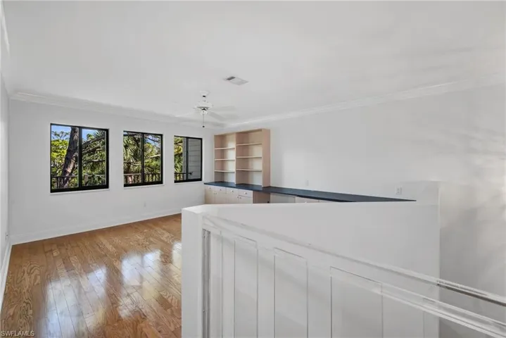 Large loft can be utilized as a second family room or shared office space