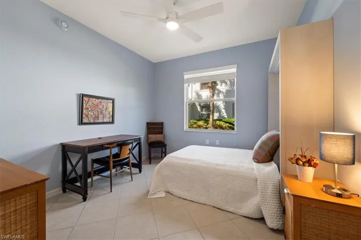The spacious den has work from home space, even when the murphy bed is opened