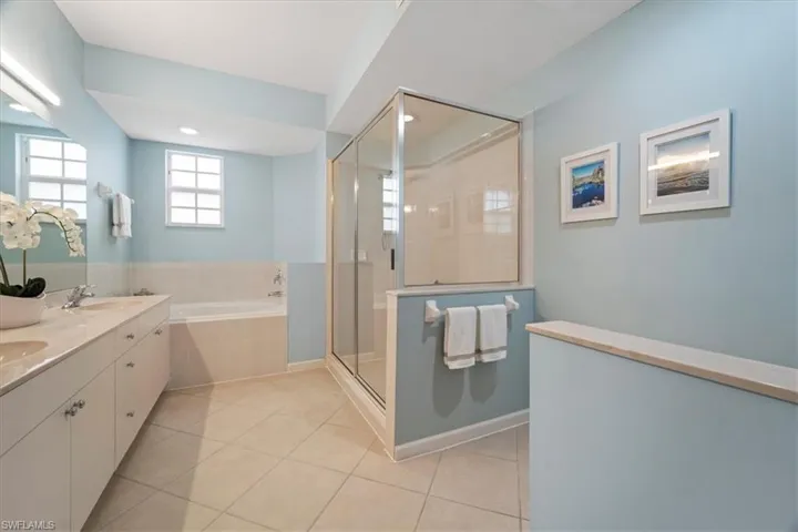 Primary Bathroom with separate soaking tub and roomy shower