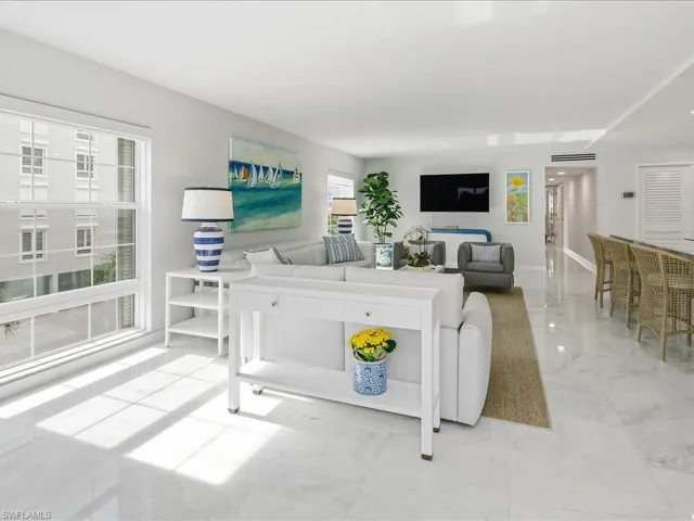 Living room with light marble finish floors