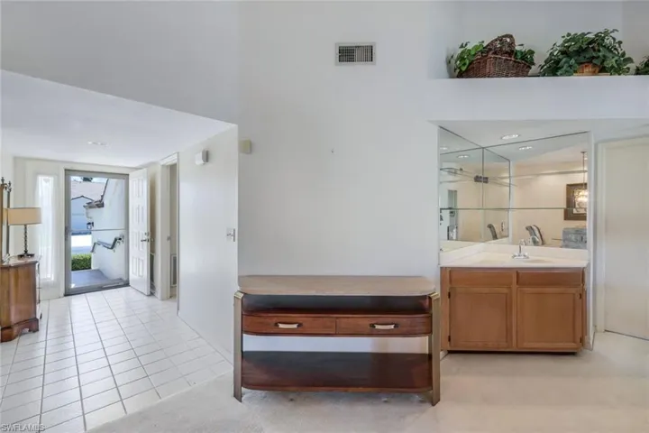 Foyer Entry- View of Wet Bar