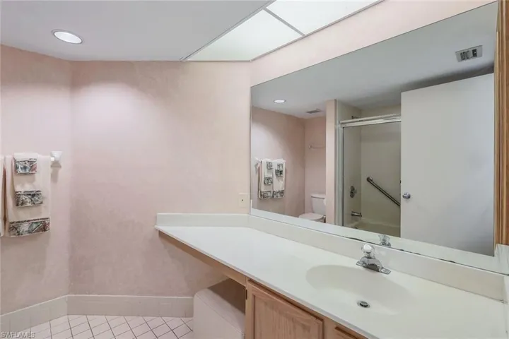 Full Guest Bath with Tub/Shower Combination, Make Up Vanity
