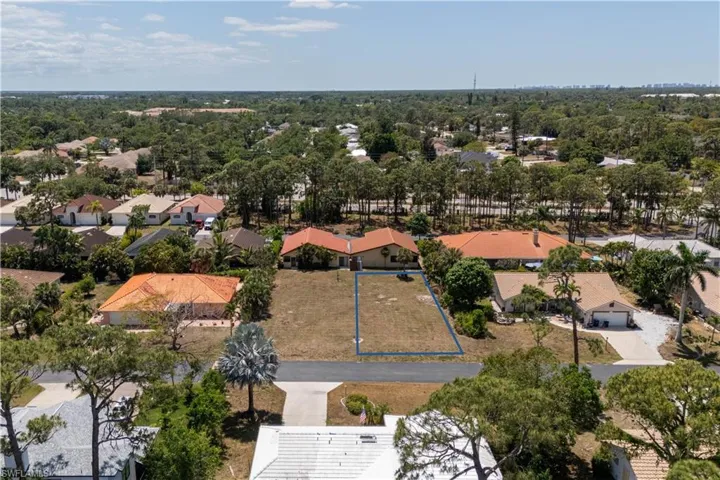 Birds eye view of property with a residential view