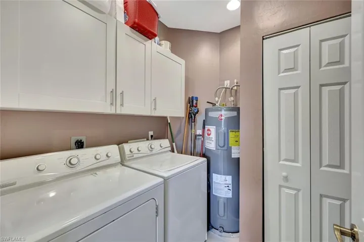 Laundry room. Added cabinets for storage.