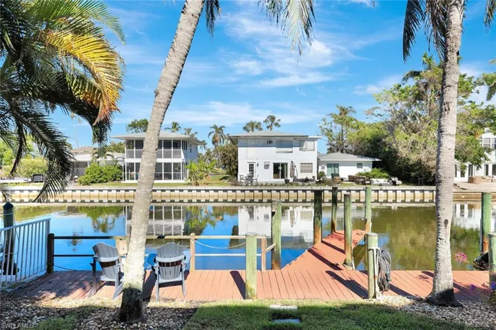 Dock space is directly in front of the chairs on the west side.