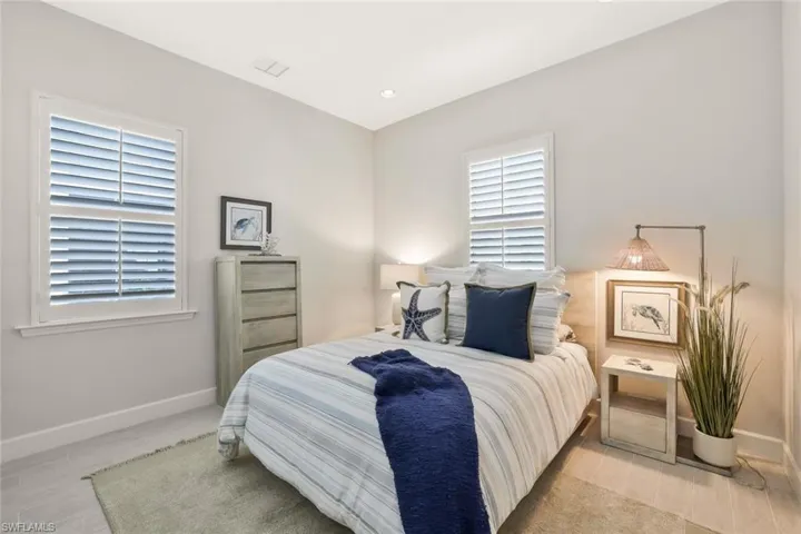 Bedroom featuring wood finish floors