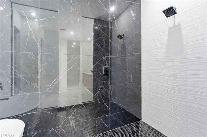Full bathroom with a walk in shower