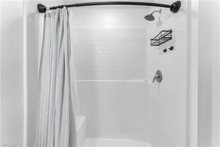 shower with built in bench seat