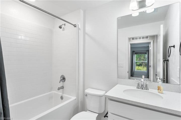 2nd bath with tub/shower combo looks like it is tiled!