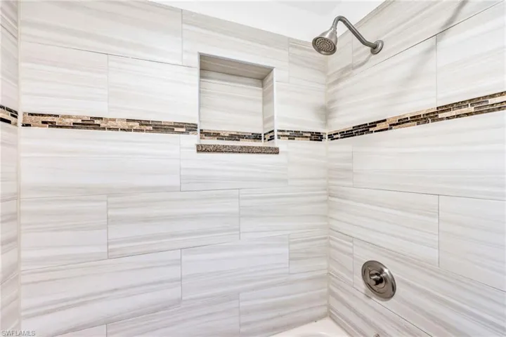 Bathroom featuring tub / shower combination