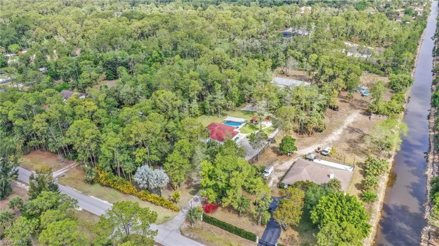 Drone / aerial view of a heavily wooded area