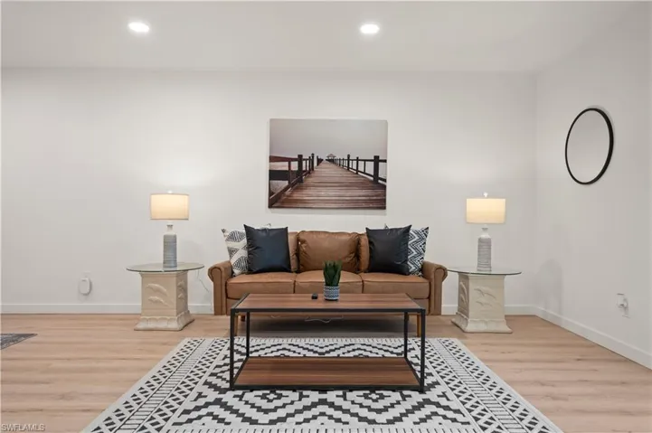 Living room featuring wood-type flooring