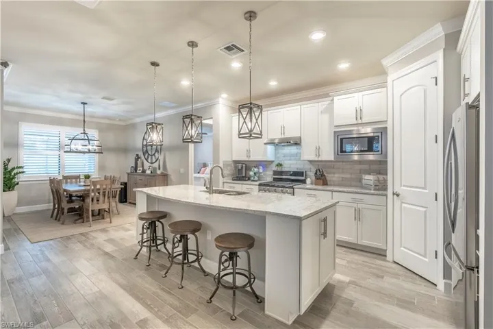 7473 Winding Cypress Dr, Naples, Florida 34114