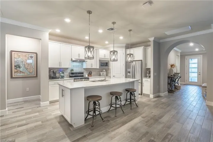 7473 Winding Cypress Dr, Naples, Florida 34114