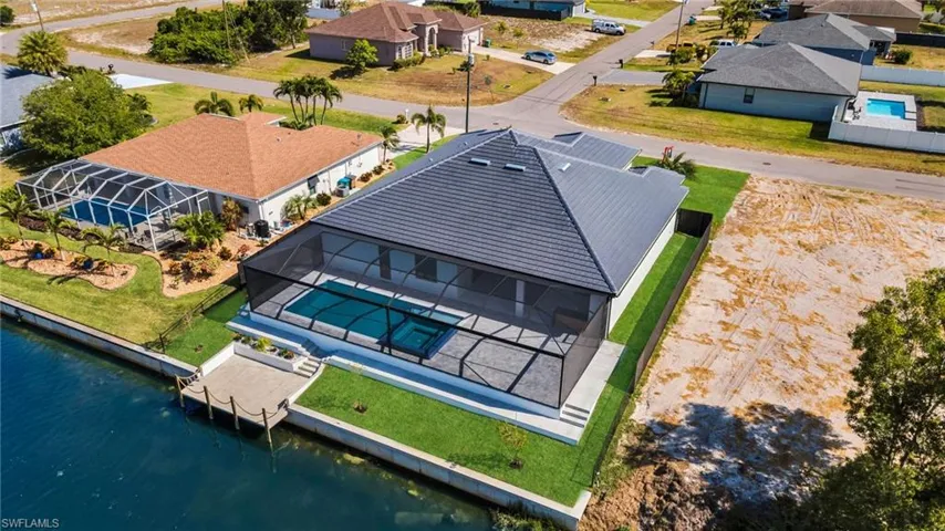 Bird's eye view with a residential view and a water view