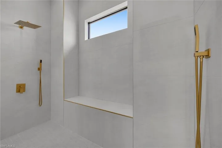 Bathroom with tiled shower