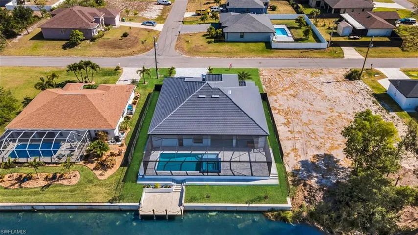 Birds eye view of property with a residential view