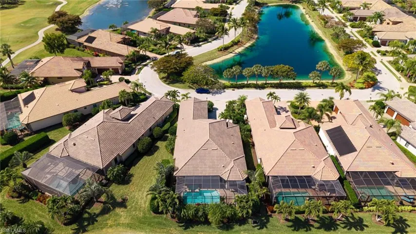 Aerial view of residential area with a nearby body of water
